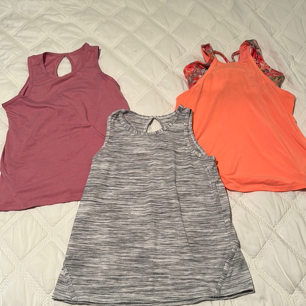 Athleta Girl - Lot of 3 tank tops in good condition.